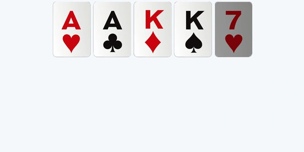 Two pair poker hand with aces and kings plus kicker card